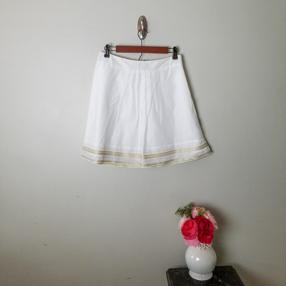 {the limited} white w/ gold trim circle mini skirt